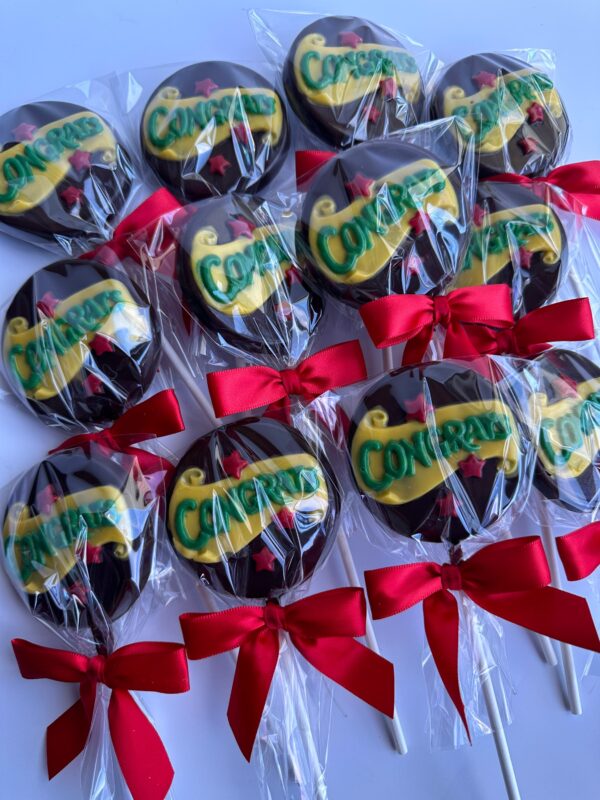 12-Congratulations Chocolate Lollipops, round and wrapped in clear plastic with a yellow 'Congrats' message, featuring red bows at the base.