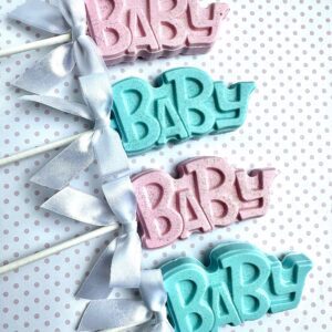 24-BABY Chocolate Lollipops for Baby Showers, featuring pink and blue designs with white bows on sticks, set against a polka dot background.