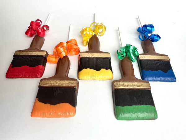Five Paint Brush Chocolate Lollipops for Birthday Party/Party Favors with colorful bows: red, yellow, blue, orange, and green.
